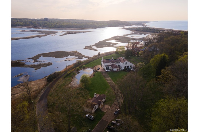 Aerial overview of property, cottage and land