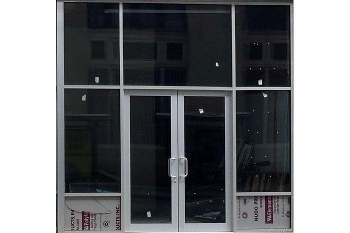 Street view of entrance to space for rent