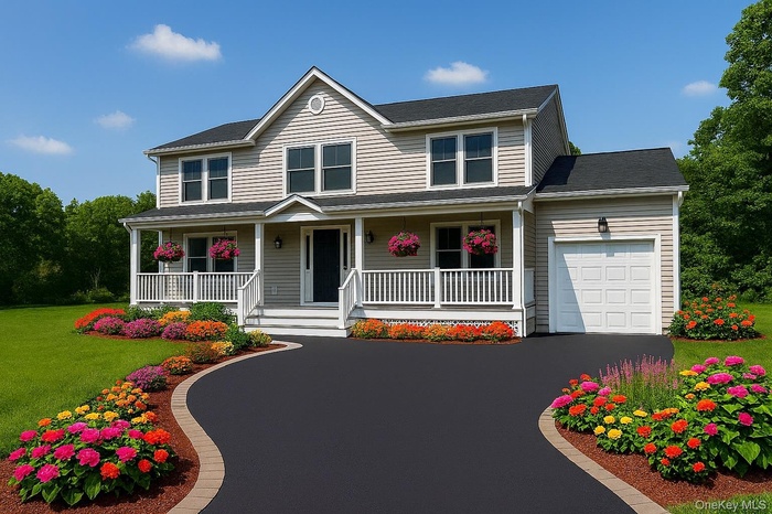 View of front of house featuring a porch, driveway, a garage, and a front yard