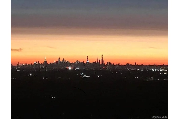 Nature at dusk featuring a view of skyline