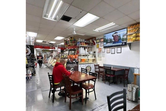Dining space with a drop ceiling