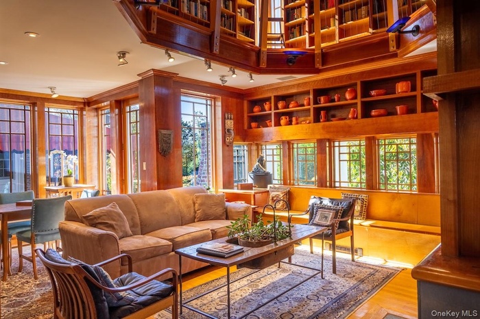 Relax any time of day in this multi-function room beneath the Library, looking out on to the expansive back yard