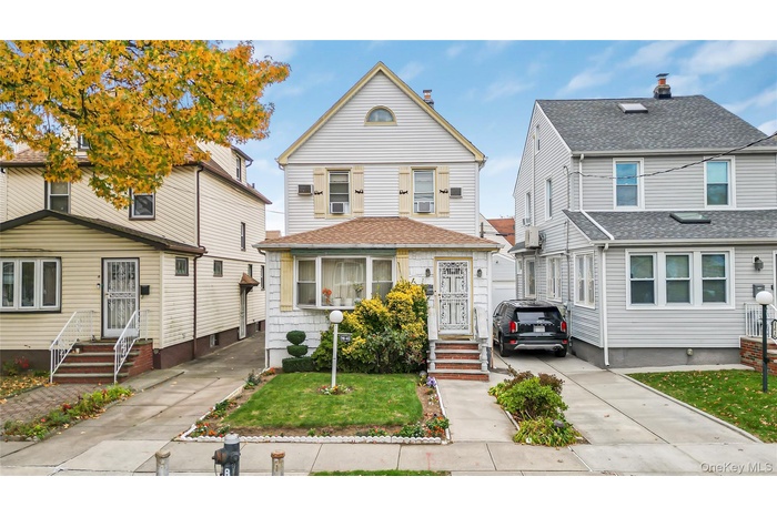 View of front facade featuring entry steps