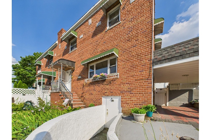 View of front facade with brick siding
