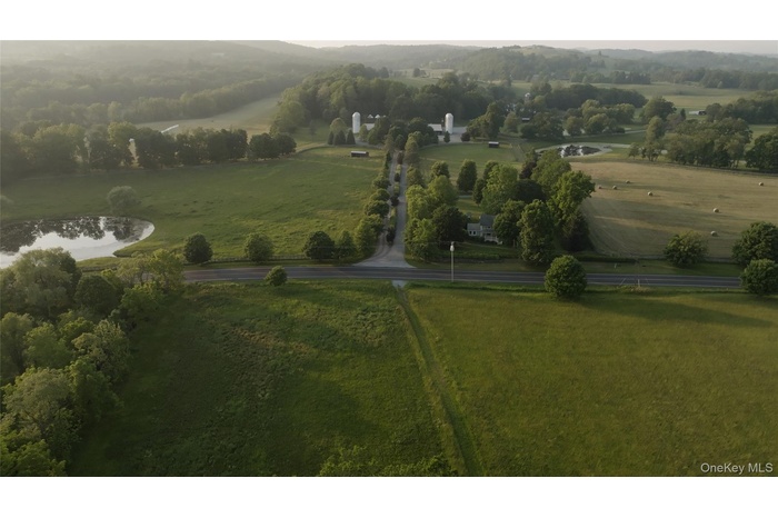 View of property location featuring rural landscape and a large body of water
