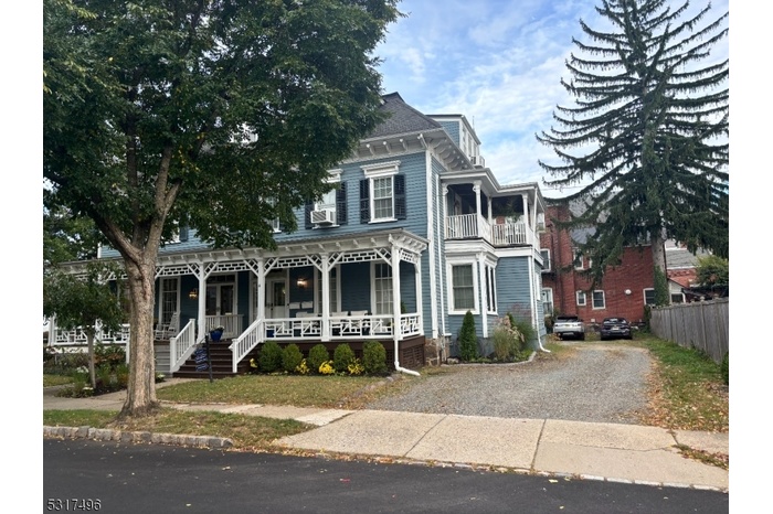 Front View With Driveway