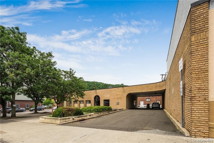 View of front of house featuring brick siding