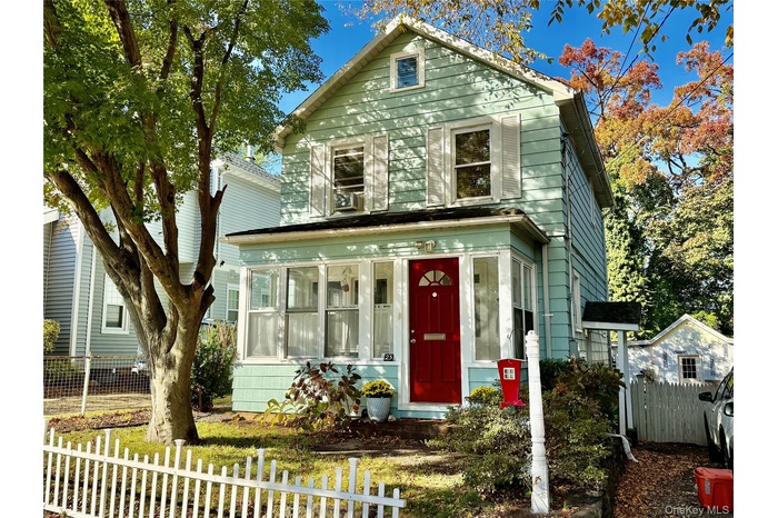 View of front of house with covered porch