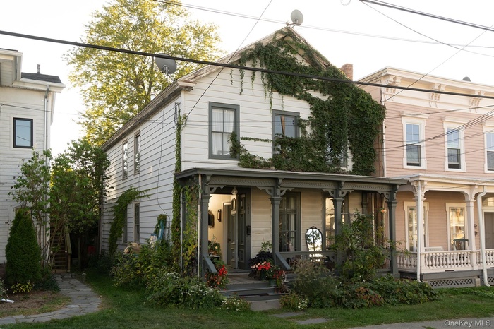 View of front of property with a porch