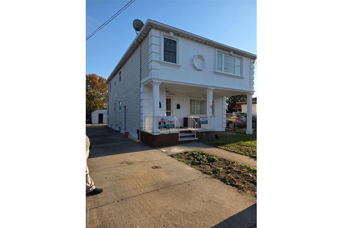 View of front facade featuring covered porch