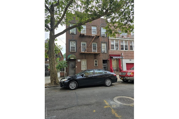 View of front of home with brick siding