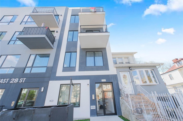 View of property with fence