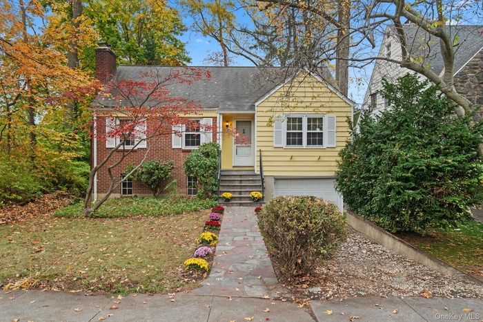 Welcome to 8 Concord Avenue, a charming Larchmont home brimming with potential just steps from town and Turtle Park.