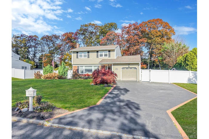 Beautiful Colonial with Spacious Driveway, 1 Car Garage, .47 Acres, Mature Landscaping