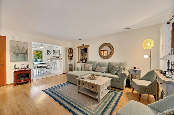 Living room with light wood-type flooring