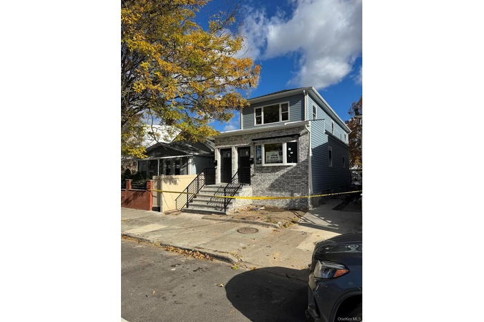View of front of home with brick siding