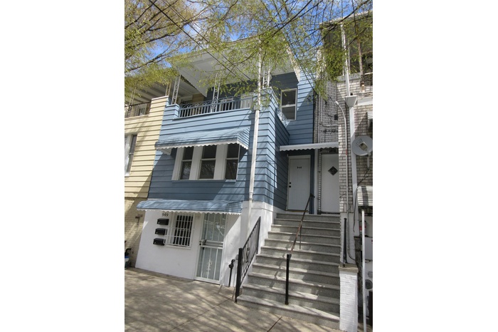 View of property with stucco siding