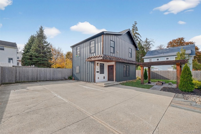 Front of unit with off street parking