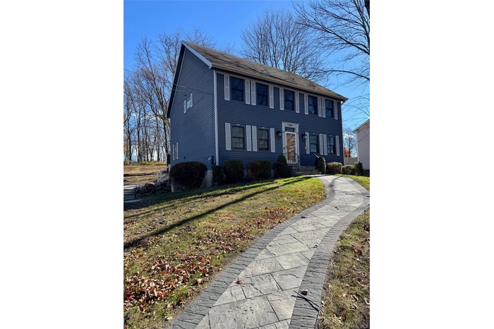 Colonial house with a front lawn