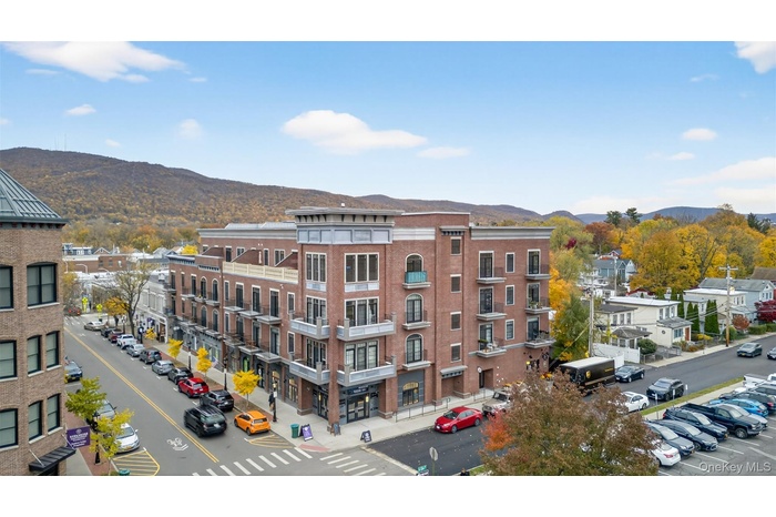 View of apartment building / complex with a mountain view