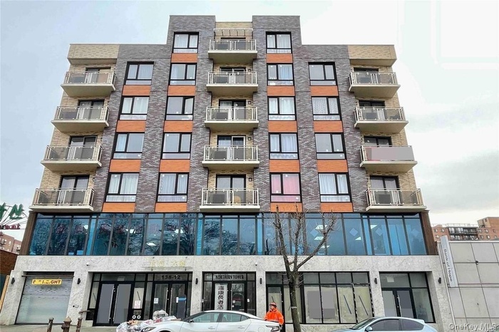 View of building exterior with cooling unit