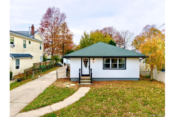 Bungalow with a shingled roof