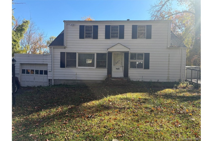 View of front of house with an attached garage