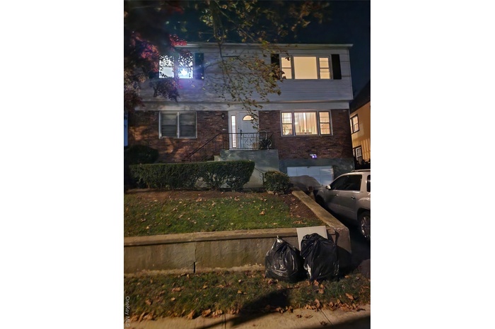 View of front of property with brick siding