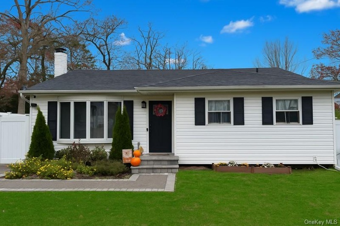 View of front facade featuring a beautiful paved entry way
