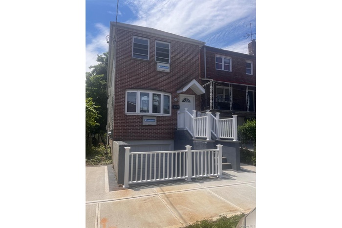 Traditional home with brick siding