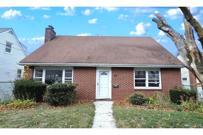Cape Cod-style two family home