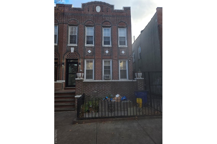 View of front facade with brick siding
