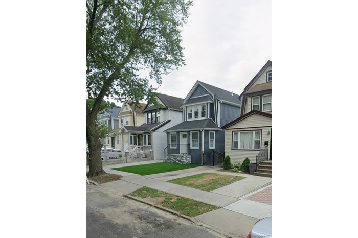 View of front of home with a residential view