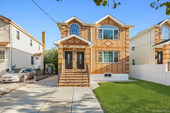 Traditional home with brick siding