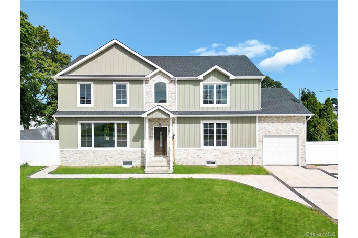 Craftsman house featuring a garage, concrete driveway, and a shingled roof