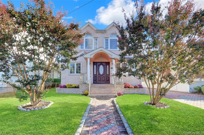 View of front facade with brick siding