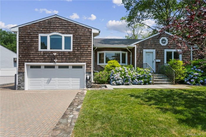 Perfectly appointed to house 2 cars in the attached garage with space for 3+ cars in the driveway.