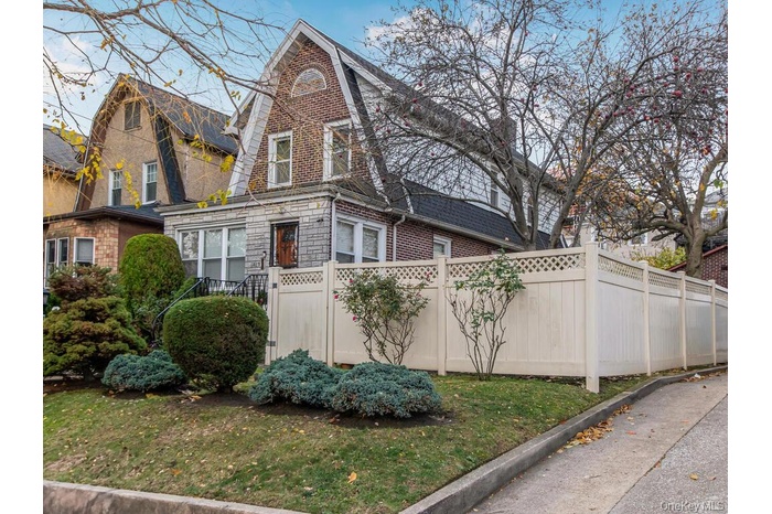 Colonial inspired home with a gambrel roof
