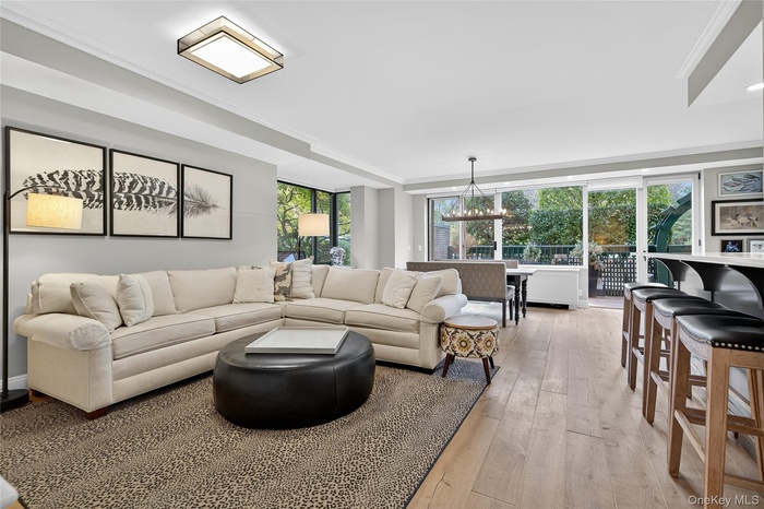 Living room featuring light wood-style floors