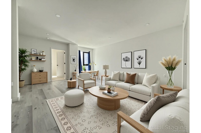 Living room featuring recessed lighting and light wood finished floors