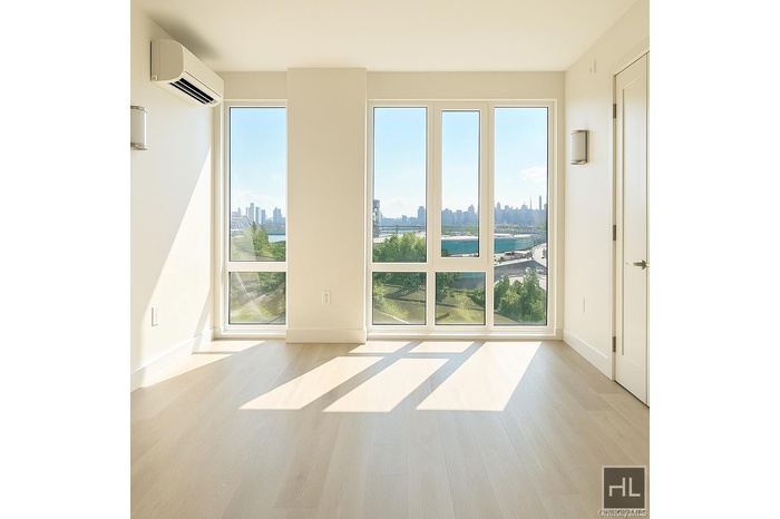 Unfurnished room with a view of skyline, light wood-style flooring, and a wall mounted AC