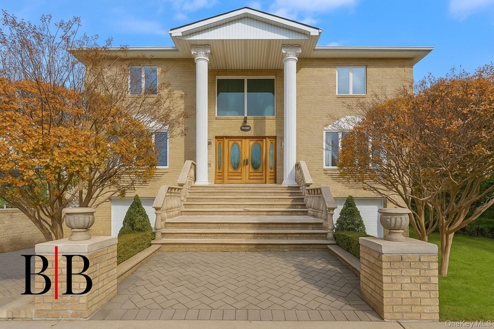 View of front of house with brick siding
