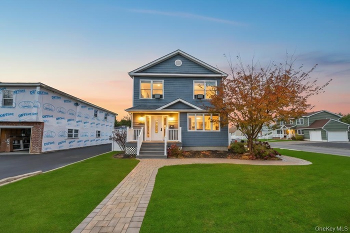 View of front of home with a front lawn