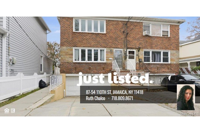 Back of house featuring brick siding, a garage, and concrete driveway