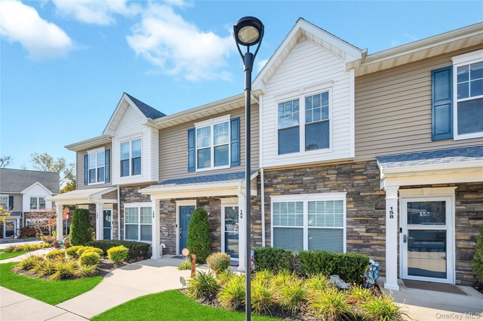 View of front of home with stone siding