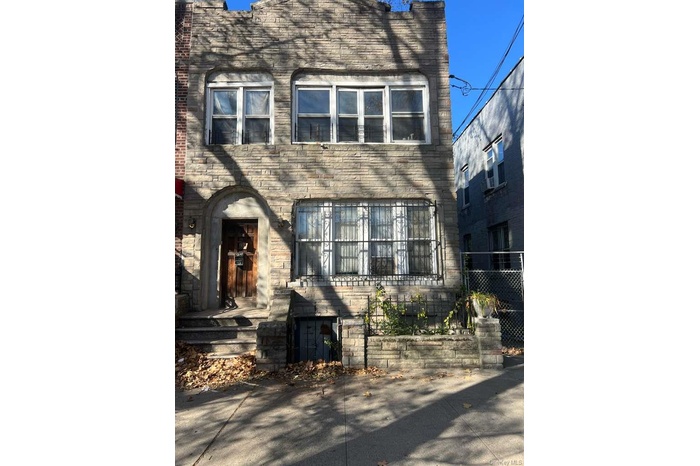 View of front facade with stone siding