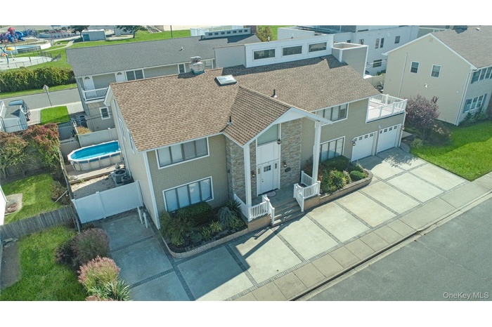 Aerial view of residential area with a pool