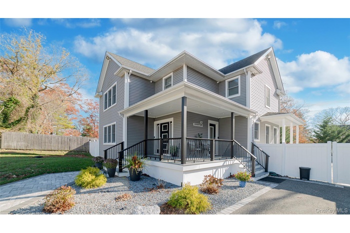 View of front of property with covered porch