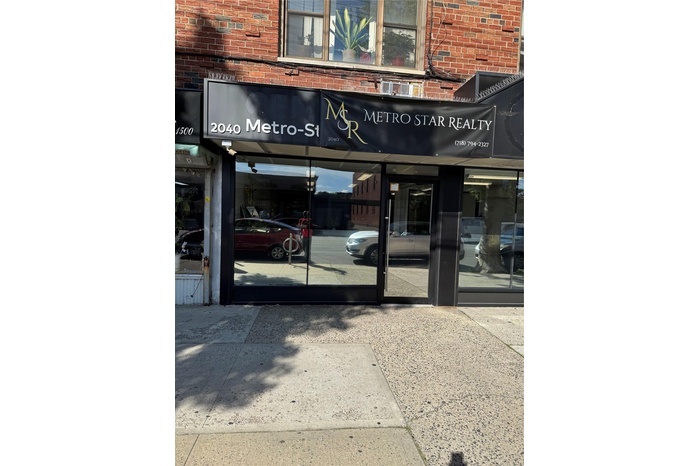 Property entrance with brick siding