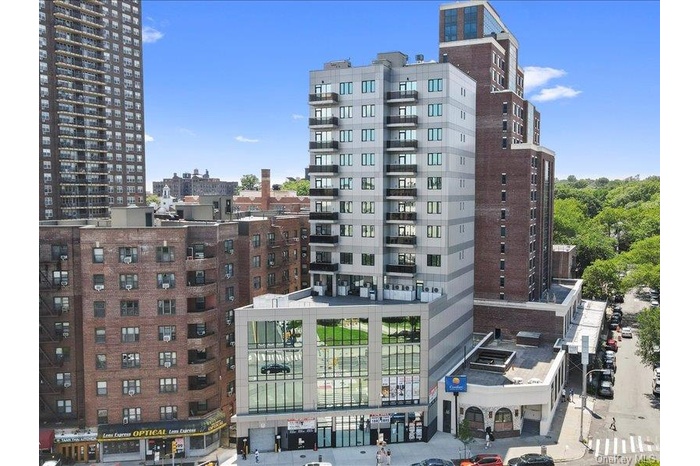 View of apartment building / complex with a city view